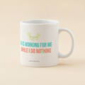 AI Is Working For Me While I Do Nothing mug in white, printed in teal and coral with a small hammock drawing