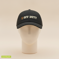 Passport AI Automation Me Time hat in black, embroidered with OFF DUTY and a small stamp icon, on a foam mannequin head