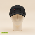 Debuggin' hat in black with a small terminal window patch reading debugging, on a foam mannequin head