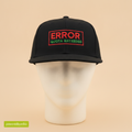 Token Usage Quota hat in black, embroidered with ERROR QUOTA EXCEEDED in red and green, on a foam mannequin head