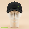 I Sold An App hat in black, with i sold an app embroidered in small code style lettering, on a foam mannequin head