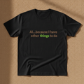 AI...Because I Have Other Things To Do tee in black, with the slogan AI...because I have other things to do in tan and green lettering, laid flat