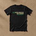 Work Smarter, Not Harder tee in black, printed with 2026 WORK SMARTER NOT HARDER MAKE AI DO IT in cream and teal, laid flat